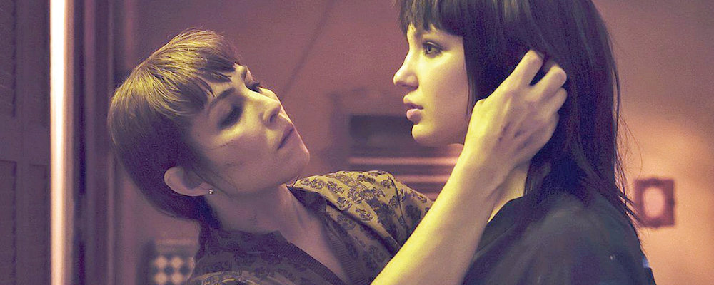Noomi Rapace as Sam Carlson and Sophie Nélisse as Zoe Tanner in Close, directed by Vicky Jewson.
Gareth Gatrell/Netflix